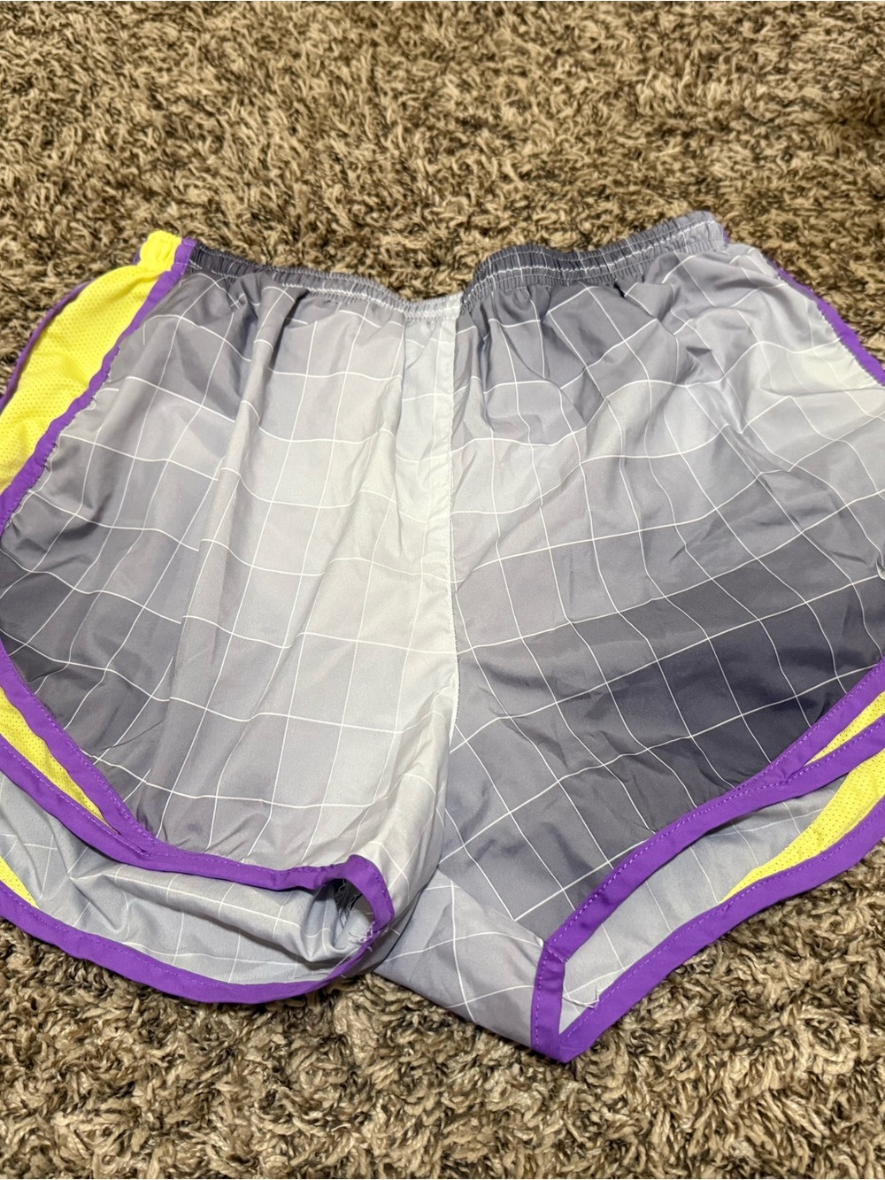 Nike Gray Grid Athletic Shorts with Purple Trim and Yellow Panels
